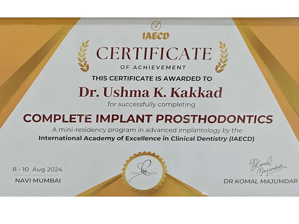 International-certified-implant-dentist-Surat.png